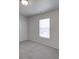 Bedroom featuring a window with blinds and double closet doors at 4018 Larkhaven Village Dr, Charlotte, NC 28215