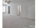 Spacious carpeted bedroom with ceiling fan at 4018 Larkhaven Village Dr, Charlotte, NC 28215
