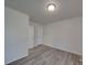 Bright bedroom featuring neutral walls and vinyl plank flooring at 4018 Larkhaven Village Dr, Charlotte, NC 28215