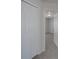 This hallway features a closet and leads to a room with carpet at 4018 Larkhaven Village Dr, Charlotte, NC 28215