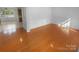 Inviting living room featuring hardwood floors, fresh paint, and an open layout at 4035 Caldwell Ridge Pkwy, Charlotte, NC 28213