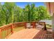 A spacious back deck overlooking a fenced backyard at 4050 Leafmore St, Concord, NC 28027