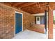 A blue door and access to a rear porch offer ample access to the back yard at 4050 Leafmore St, Concord, NC 28027