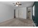 Bedroom with neutral carpet, walk in closet and ensuite bath at 4050 Leafmore St, Concord, NC 28027