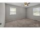 Bedroom with neutral walls, carpet, and ceiling fan at 4050 Leafmore St, Concord, NC 28027
