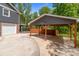 View of the carport, back yard, and garage at 4050 Leafmore St, Concord, NC 28027