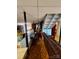 Basement offers versatile space, stairs and partially open kitchen area at 406 S Caldwell Ave, Newton, NC 28658