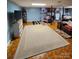 Spacious basement living area, illuminated by natural light from the windows at 406 S Caldwell Ave, Newton, NC 28658