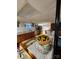 Galley kitchen with classic wood cabinets and white countertops in the basement at 406 S Caldwell Ave, Newton, NC 28658
