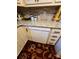 Kitchen featuring granite countertops, white dishwasher, and tile backsplash at 406 S Caldwell Ave, Newton, NC 28658