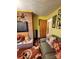 Comfortable living room featuring brick fireplace and plush furniture at 406 S Caldwell Ave, Newton, NC 28658