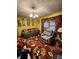 Cozy living room featuring neutral sofa, comfy recliner, and floral rug at 406 S Caldwell Ave, Newton, NC 28658