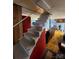 Stairs leading down to a finished basement living area with hardwood floors at 406 S Caldwell Ave, Newton, NC 28658