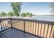 Stunning waterfront views from the home's private deck overlooking the lake at 451 S Strand Dr, Norwood, NC 28128