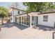 White, renovated lake home featuring a large grey deck perfect for entertaining overlooking a beautiful view at 451 S Strand Dr, Norwood, NC 28128