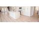 Stylish kitchen with a large island, stainless steel appliances, and modern cabinetry at 451 S Strand Dr, Norwood, NC 28128