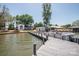 Picturesque waterfront property with a boat dock, inviting views, and a charming home at 451 S Strand Dr, Norwood, NC 28128