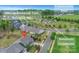 Aerial view of a property in Belmont, NC, with a community pool and residents' clubhouse at 504 Gardenbrook Trl, Belmont, NC 28012