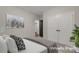 Bright bedroom features a double door closet, neutral paint, and space for comfortable living at 504 Gardenbrook Trl, Belmont, NC 28012