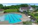 Stunning community pool and clubhouse offering residents a relaxing and luxurious recreational space at 504 Gardenbrook Trl, Belmont, NC 28012