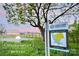 Community trailhead sign with a map, perfect for outdoor enthusiasts and nature lovers at 504 Gardenbrook Trl, Belmont, NC 28012