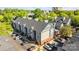 Apartment building features brick foundation, neutral siding, and ample parking at 505 N Graham St # 2H, Charlotte, NC 28202
