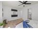 Bright main bedroom with ample natural light, wood floors, and stylish decor at 505 N Graham St # 2H, Charlotte, NC 28202