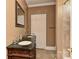 Bathroom boasts a stylish vanity with dual sinks and a granite countertop at 505 S South St, Gastonia, NC 28052