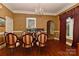 Bright dining room featuring hardwood floors and a chandelier, perfect for Gathering dinners at 505 S South St, Gastonia, NC 28052