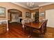 Spacious dining room with hardwood floors, a chandelier, and ample space for entertaining at 505 S South St, Gastonia, NC 28052