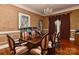 Elegant dining room featuring hardwood floors, chandelier, and ample space for gatherings at 505 S South St, Gastonia, NC 28052
