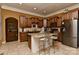 Well-equipped kitchen with custom cabinetry, a central island, and stainless steel appliances at 505 S South St, Gastonia, NC 28052