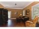 Cozy living room features hardwood floors, crown molding and a comfortable seating arrangement at 505 S South St, Gastonia, NC 28052