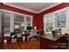 Bright office space with hardwood floors, large windows and two computer setups at 505 S South St, Gastonia, NC 28052