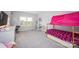 Cozy bedroom with a bunk bed, desk, and natural light from the window at 5051 Hyannis Ct, Matthews, NC 28104