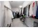 Large walk-in closet with ample storage space, featuring shelving and hanging rods for organized clothing and accessories at 5051 Hyannis Ct, Matthews, NC 28104