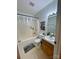 Functional bathroom with a shower-tub combination and a vanity with a mirror at 5065 Gateway Dr, Claremont, NC 28610