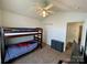 Bedroom with vaulted ceiling, carpeted floor, and a ceiling fan for comfort at 5065 Gateway Dr, Claremont, NC 28610