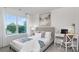 Comfortable bedroom with a cozy bed, desk, and a bright window offering natural light at 5132 Fireweed Ct, Dallas, NC 28034