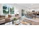 Open-concept living room and dining area, with a seamless flow to the modern kitchen at 5132 Fireweed Ct, Dallas, NC 28034