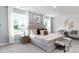 Serene main bedroom suite featuring a luxurious king-size bed, calming decor, and large windows at 5132 Fireweed Ct, Dallas, NC 28034