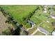 Sweeping aerial view of the house and a large backyard space in a quiet neighborhood at 5184 Swinging Bridge Rd, Conover, NC 28613