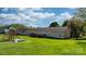 Expansive backyard with play set, lush lawn, and partial fence, great for outdoor activities at 5184 Swinging Bridge Rd, Conover, NC 28613