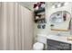 Well-organized bathroom featuring open shelving for towels and toiletries and a vanity with a sink at 5184 Swinging Bridge Rd, Conover, NC 28613