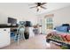 Bright bedroom offering a dedicated workspace with built-in shelving and a comfortable sleeping area at 5184 Swinging Bridge Rd, Conover, NC 28613