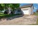 Charming single-story home with a well-maintained yard, driveway, and attached garage at 5184 Swinging Bridge Rd, Conover, NC 28613