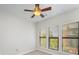 Bright bedroom with large windows and ceiling fan at 562 New Bern Station Ct, Charlotte, NC 28209