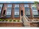 Beautiful townhome with brick exterior, modern windows, and well-maintained landscaping, plus convenient front access at 562 New Bern Station Ct, Charlotte, NC 28209