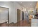 View of the home interior showing hard wood floors and a kitchen area at 562 New Bern Station Ct, Charlotte, NC 28209