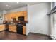 Modern kitchen featuring updated appliances and granite countertops at 562 New Bern Station Ct, Charlotte, NC 28209